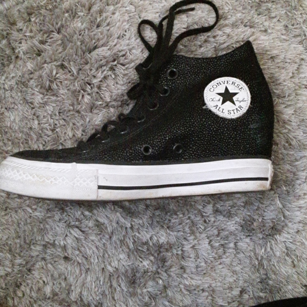 Black heeled Converse